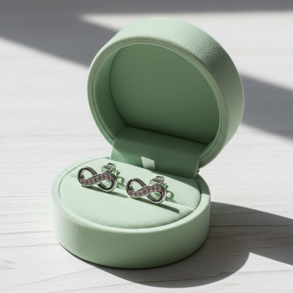 Infinity Pave CZ Stud Earrings – 925 Sterling Silver
