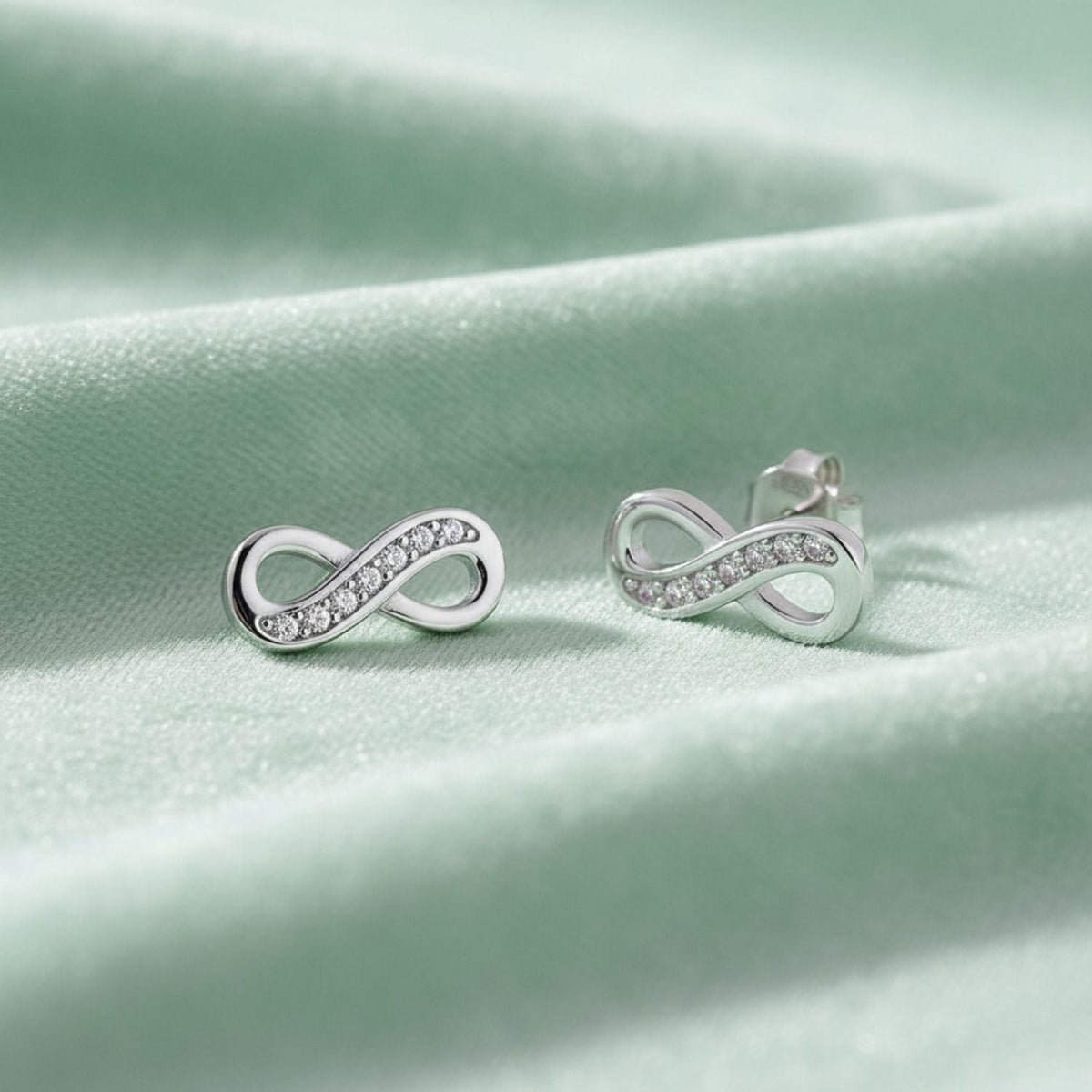 Infinity Pave CZ Stud Earrings – 925 Sterling Silver