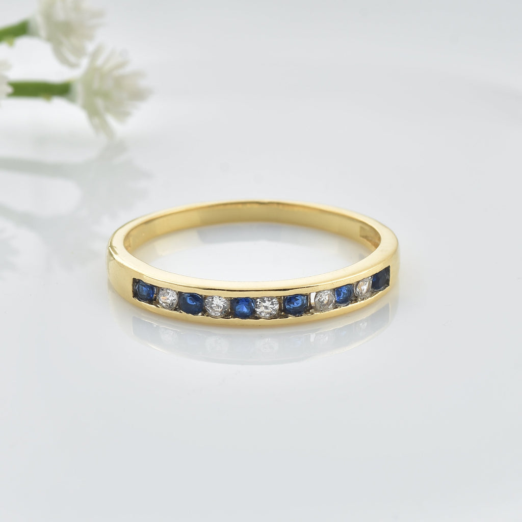 0.03 Ct Round Blue Sapphire Eternity Band Ring 925 Sterling Silver Yellow Plated
