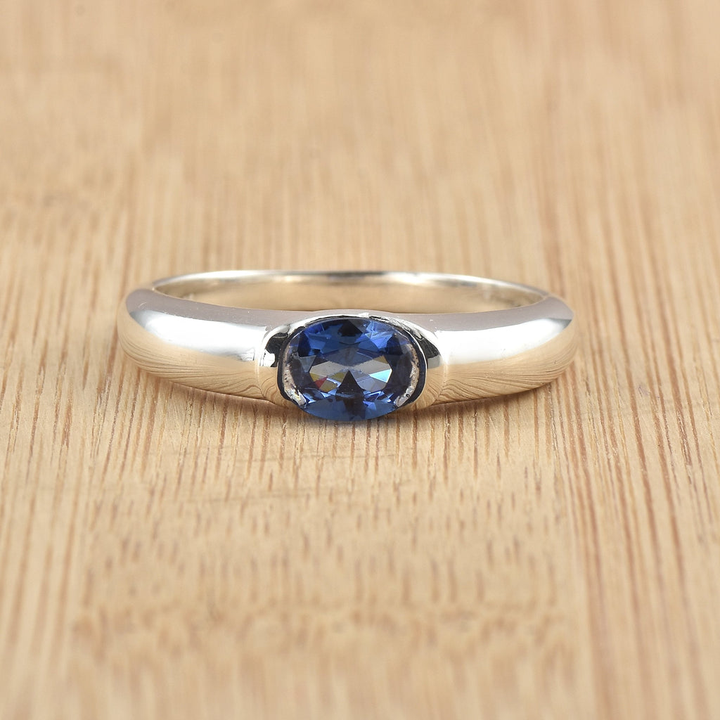 1.00 Ct Oval Tanzanite Bezel Solitaire Ring 925 Sterling Silver