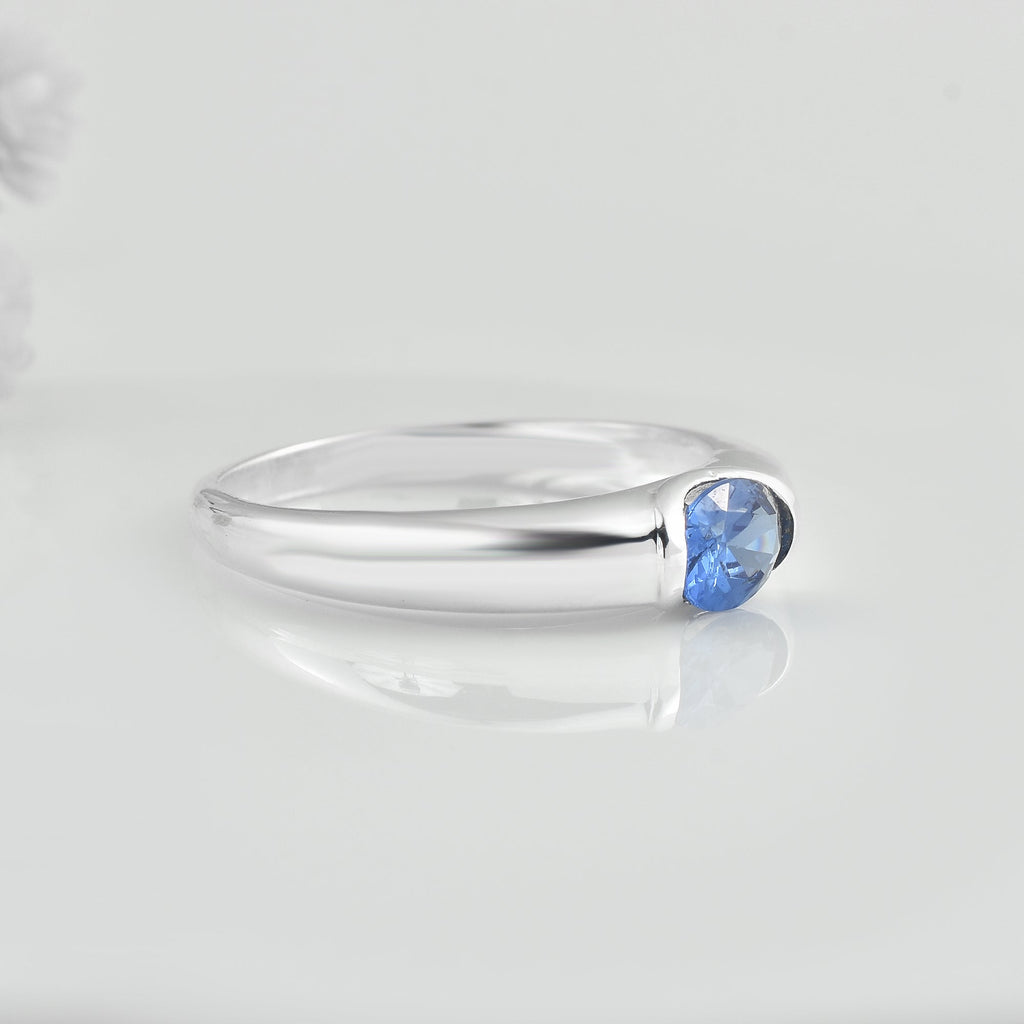 1.00 Ct Oval Tanzanite Bezel Solitaire Ring 925 Sterling Silver