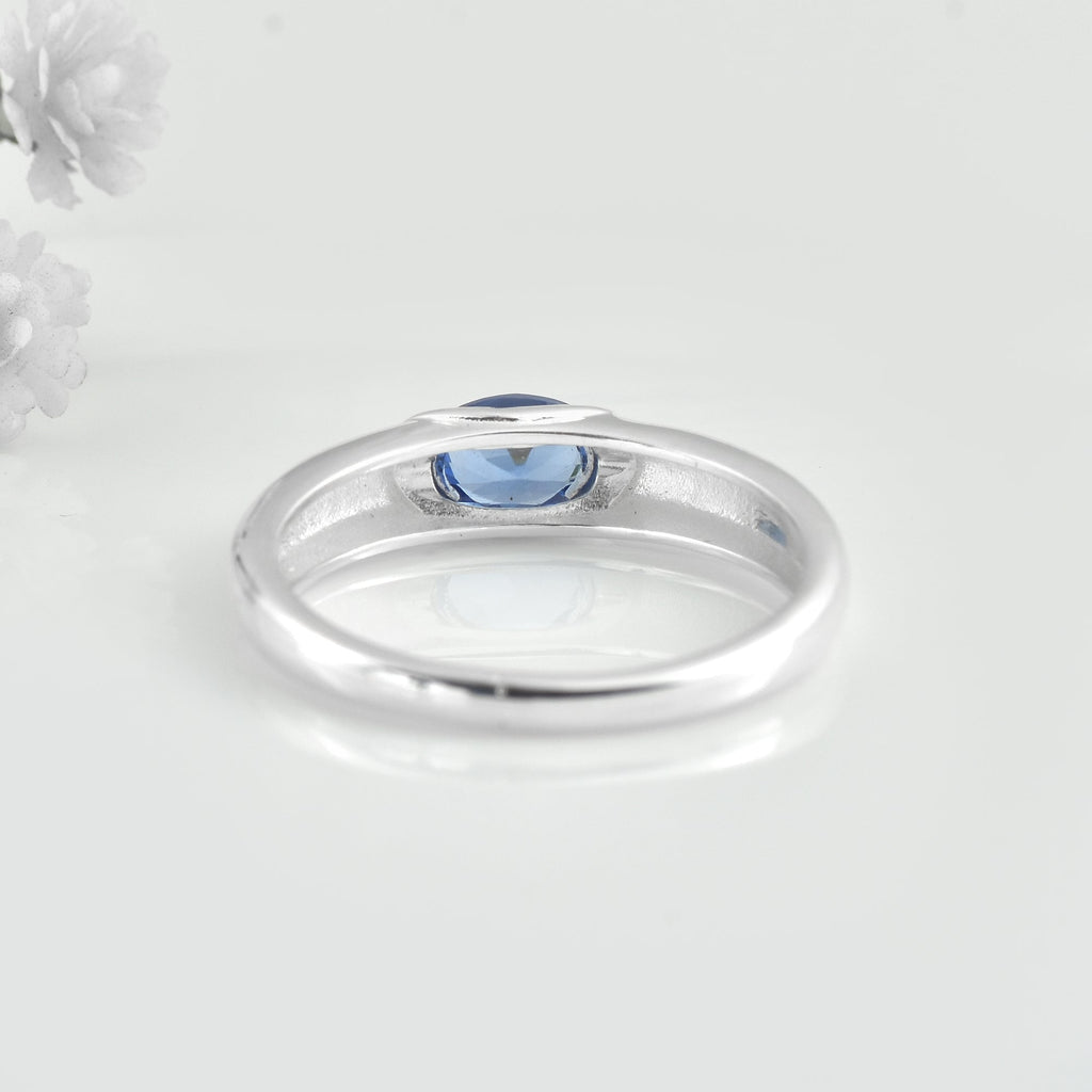 1.00 Ct Oval Tanzanite Bezel Solitaire Ring 925 Sterling Silver