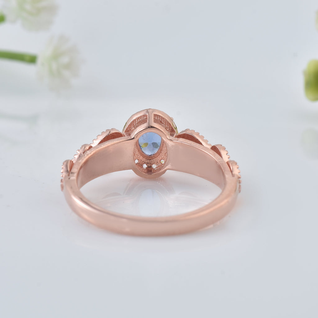 0.50 Ct Oval Shape Tanzanite Vintage Halo Ring 925 Sterling Silver Rose Plated