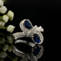 6x4mm Oval Blue Sapphire Crossover Ring - 925 Sterlign Silver
