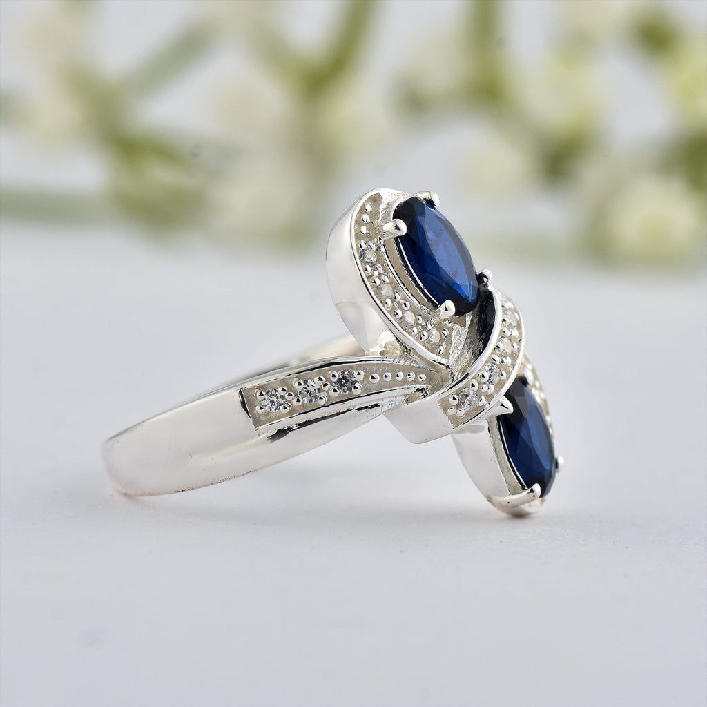 6x4mm Oval Blue Sapphire Crossover Ring - 925 Sterlign Silver