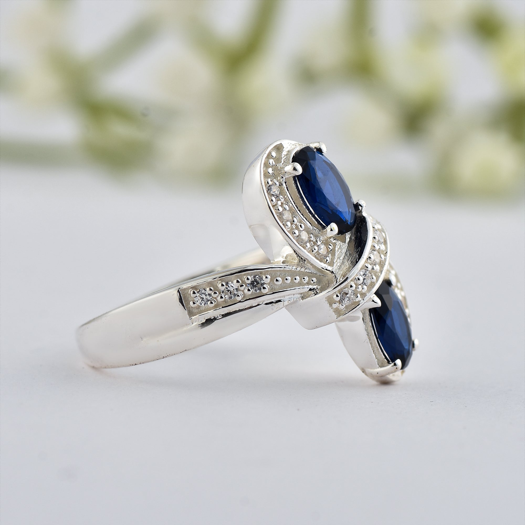 6x4mm Oval Blue Sapphire Crossover Ring - 925 Sterlign Silver