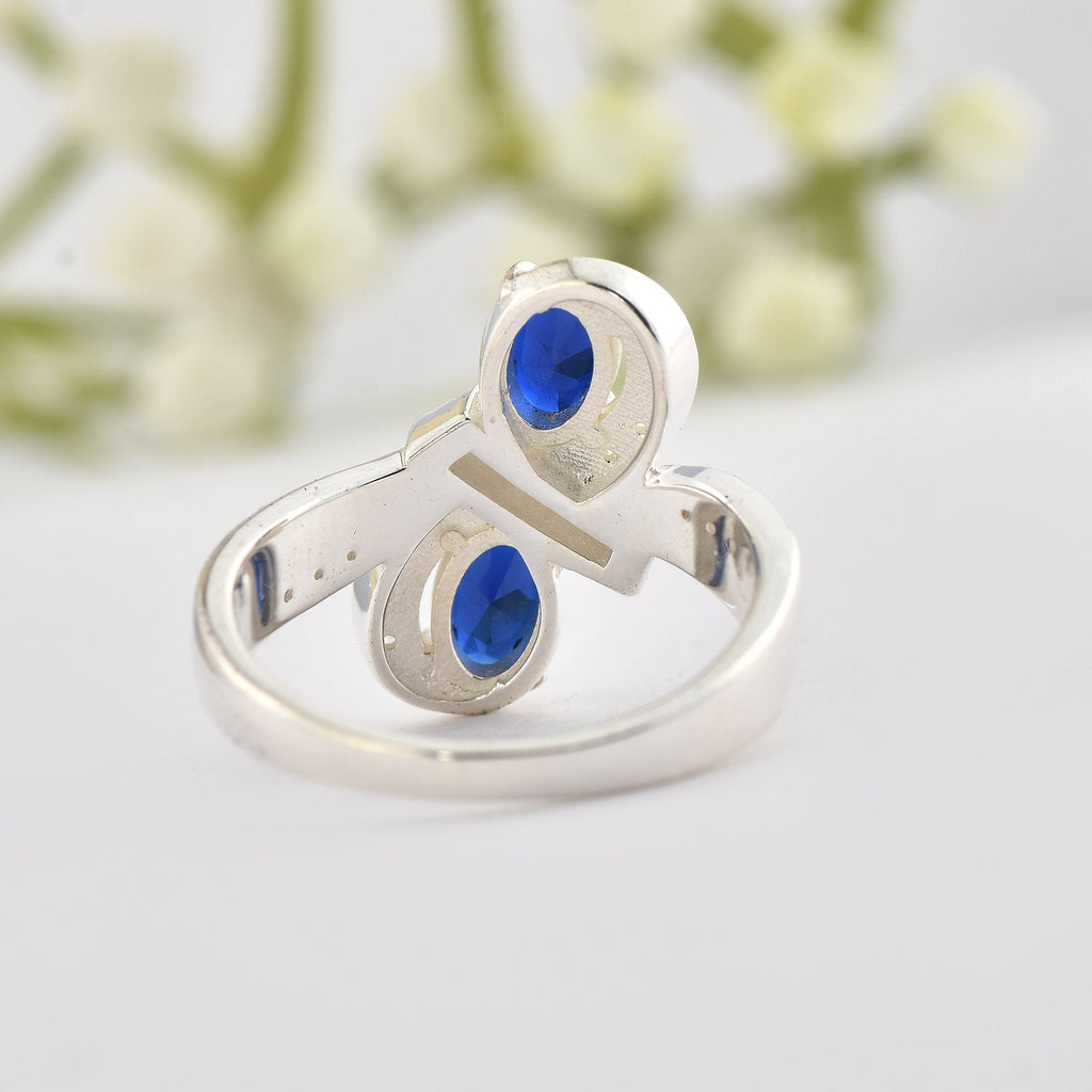 6x4mm Oval Blue Sapphire Crossover Ring - 925 Sterlign Silver