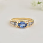925 Sterling Silver 7x5MM Oval Tanzanite Ring with White Topaz Accents Ring