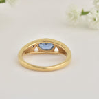 925 Sterling Silver 7x5MM Oval Tanzanite Ring with White Topaz Accents Ring