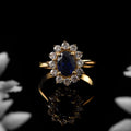 925 Sterling Silver 8x6MM Oval Blue Sapphire Halo with CZ Accents Ring
