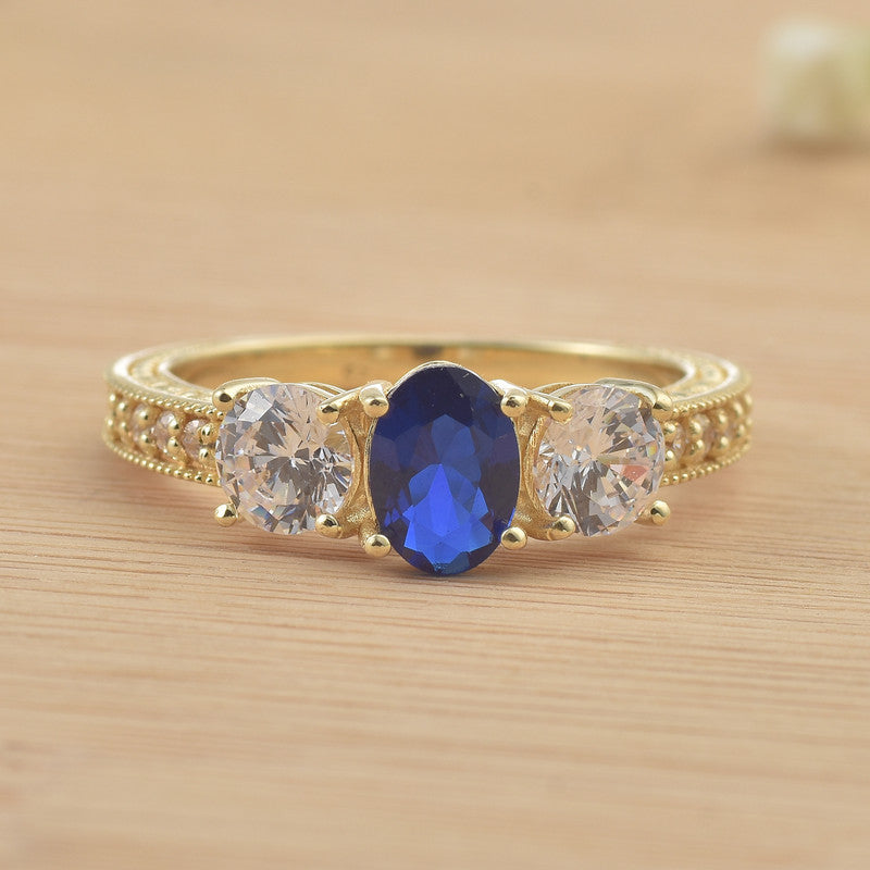 925 Sterling Silver Yellow Played 7x5mm Oval Blue Sapphire Three-Stone Ring
