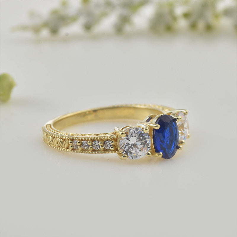 925 Sterling Silver Yellow Played 7x5mm Oval Blue Sapphire Three-Stone Ring