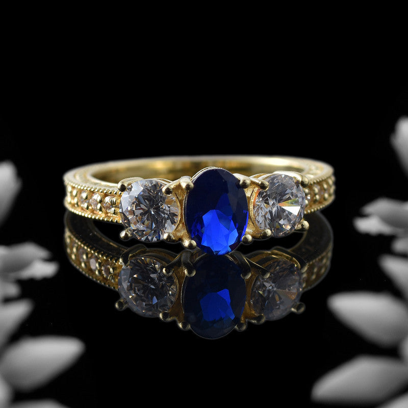 925 Sterling Silver Yellow Played 7x5mm Oval Blue Sapphire Three-Stone Ring