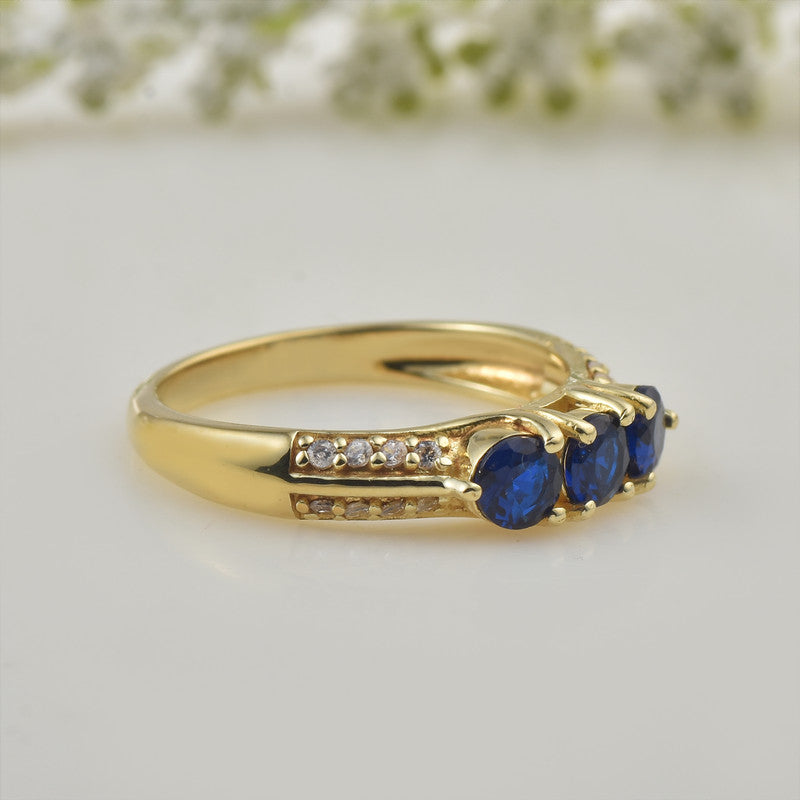 925 Sterling Silver Yellow Plated 4x4mm Round Blue Sapphire Three-Stone Ring