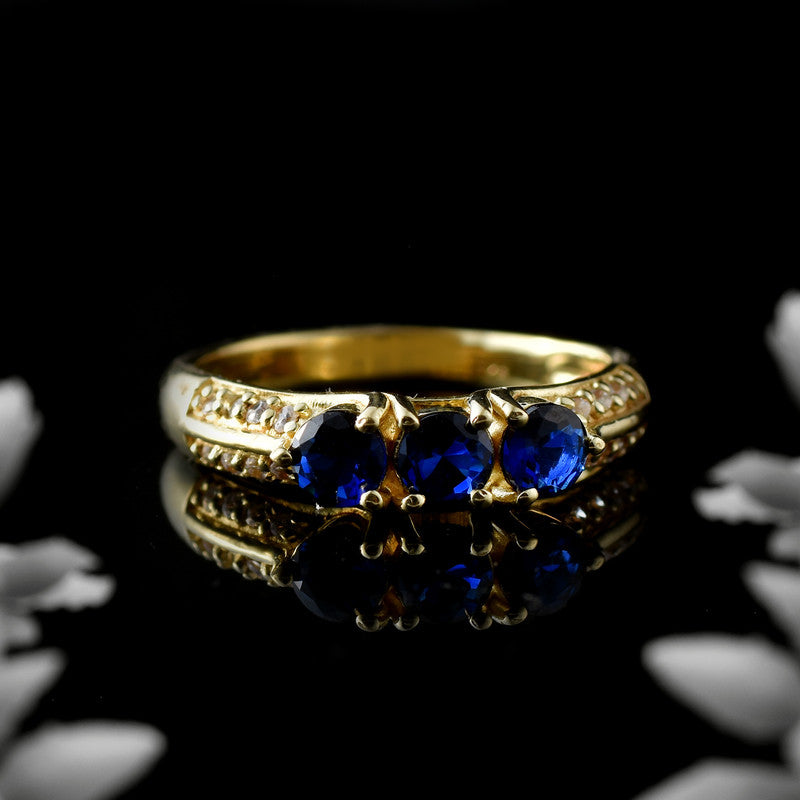 925 Sterling Silver Yellow Plated 4x4mm Round Blue Sapphire Three-Stone Ring