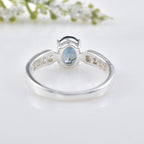 6x4mm Oval London Blue Topaz with CZ Accents Ring 925 Sterling Silver