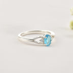 6x4mm Oval Swiss Blue Topaz Three Stone Ring 925 Sterling Silver