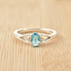 6x4mm Oval Swiss Blue Topaz Three Stone Ring 925 Sterling Silver