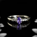 925 Sterling Silver 6x4mm Oval Tanzanite and White Stone Ring