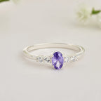 925 Sterling Silver 6x4mm Oval Tanzanite and White Stone Ring