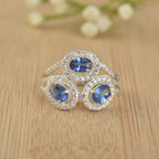 6x4mm Oval Tanzanite Triple Halo Design Ring 925 Sterling Silver