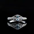 6x4mm Oval Blue Topaz Ring 925 Sterling Silver with White Accents